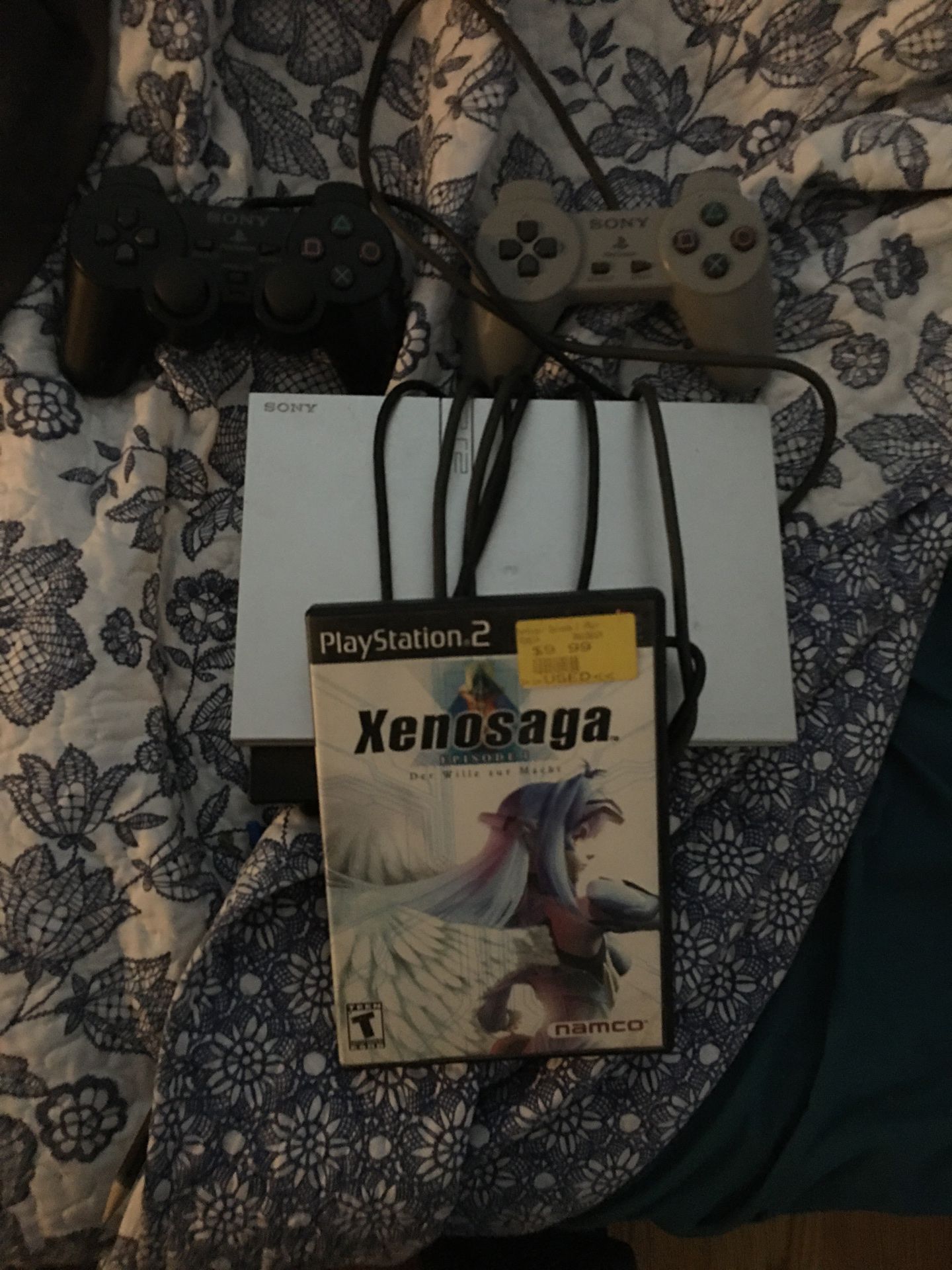 ps2 and a wi console and one game