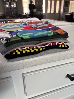 Seven small T-shirts including vintage Northface and Disney offer $25