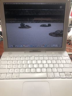 Apple iBook G4 Laptop Mac OS X Leopard