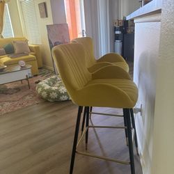 **Two Bold & Chic Yellow Velvet Bar Stools – $100**