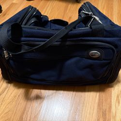 Blue American Tourister Carry on Bag 19.5” x 13” x 11”