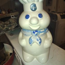 This is a vintage Pillsbury Doughboy ceramic cookie jar