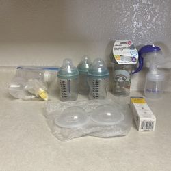 Bottles And Manuel Pumps And Breast Milk Collecting And Cream. 