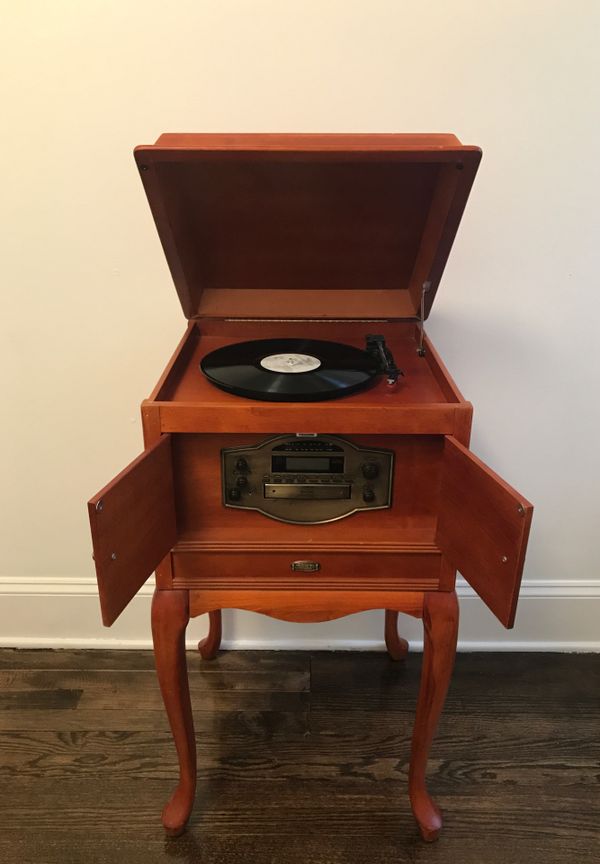 Standing Crosby record player, radio, CD player, and cassette player