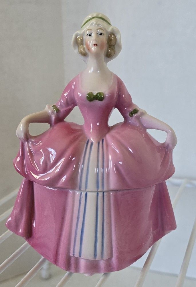VTG Porcelain Trinket / powder box. Lady with light brown hair in Pink & blue stripped dress
