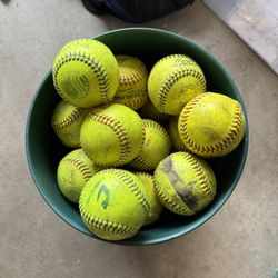Bucket Of Used 11” Softballs
