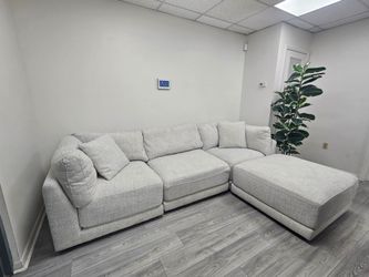 Light Gray Modular Sectional Sofa with Ottoman