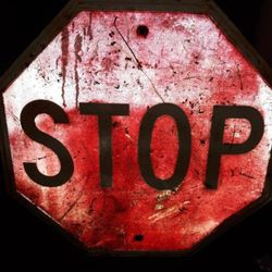 Old Vintage Embossed STOP Sign