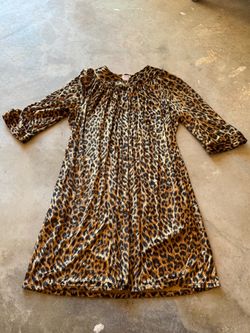 Leopard print women’s dress snaps Halloween costume