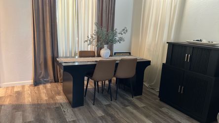 Black dining table (chairs not included)