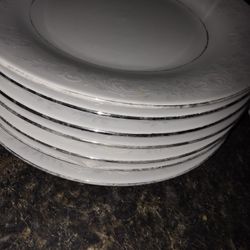 Plates, Knives,  Cups USED. SELLING AS IS Best Offer