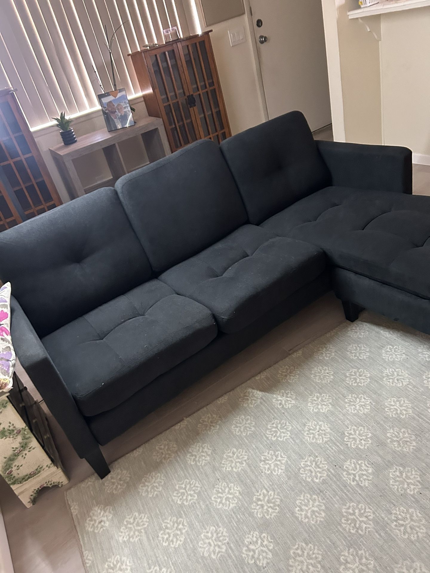 Small black sectional couch