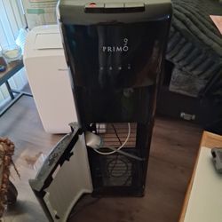Used Primo Hot/Cold/RoomTemp Water Dispenser