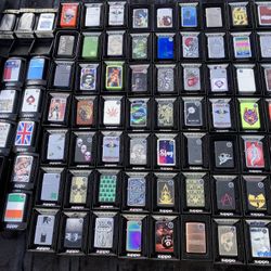 Large Lot of Authentic New In Box ZIPPO Lighters- Many Different Retired Designs 