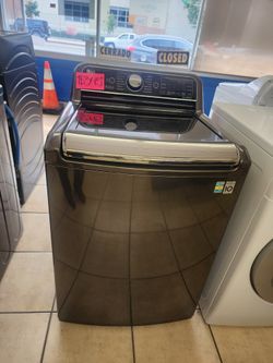 L.G. Black Stainless Top Load Washer 