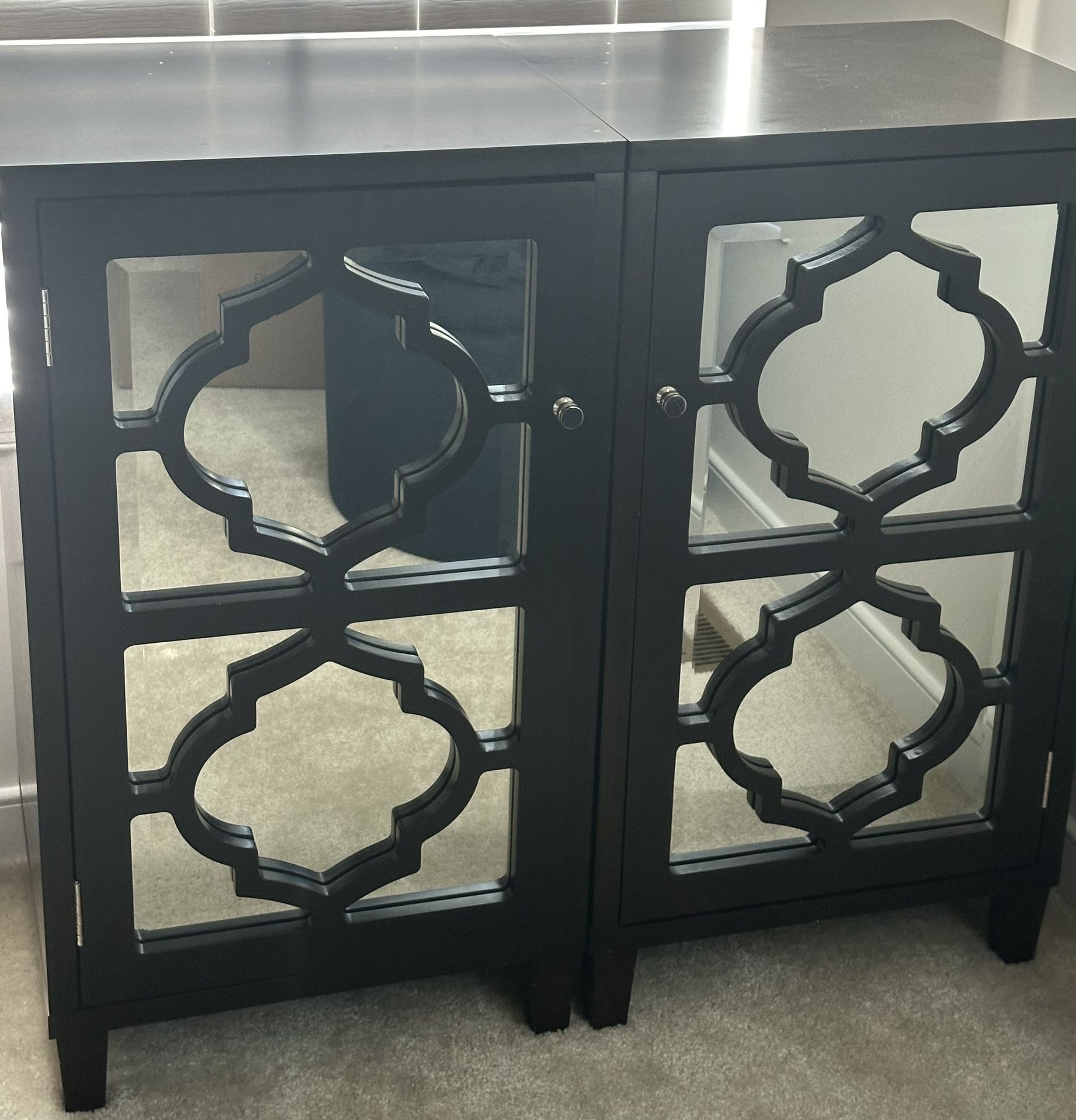 Two Wooden Cabinets With Mirrored Front