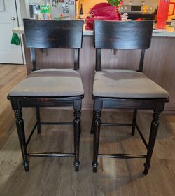 Pair of black shabby wood stools
