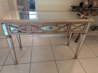 Mirrored table $75