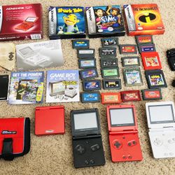 Gameboy Advance SP consoles and games cartridges Pokémon, Mario Etch…