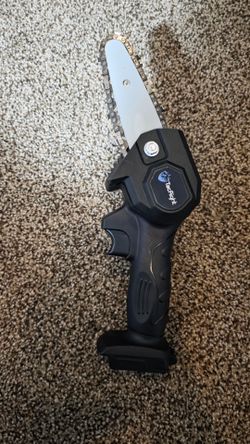 Mini 4" inch chainsaw $100.00