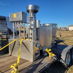 Wine bottling machine and large fermenting vats