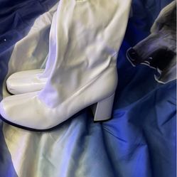 Woman’s White High Heal Boots 