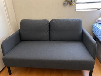 Two seater grey couch