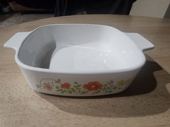 vintage Corning Ware casserole dish in the "Wildflower" pattern.