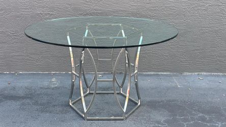 KYRIE MODEL 54” ROUND DINING TABLE W STAINLESS STEEL LEGS (no chair) by SAFAVIEH- delivery is negotiable