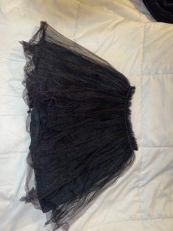 Two black tutus for kids.  Small and a med.