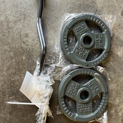 BRAND NEW 2-25 olympic plates and new olympic ez curl bar 