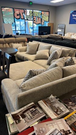 High end luxury farmhouse livingroom set was $4299 at Jeromeβs. Our deal $2600 with ottoman. Can finance can deliver $150