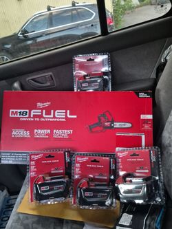 Milwaukee 8 in pruning saw and 3 m18 5.0 batteries