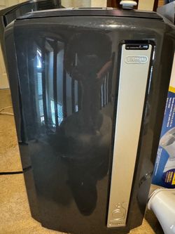 12500 BTU DeLonghi portable air conditioner with window adapter and hose