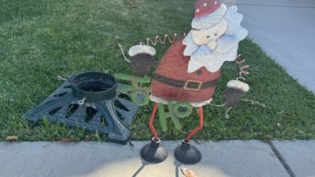 Santa Clause and Christmas tree stand