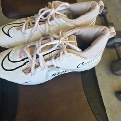 White NIKE cleats