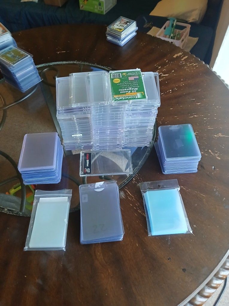 63 Used 1 Touches, Around 100 Used Top Loaders And A Pack And A 1/4 Penny Sleeves