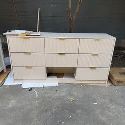 Light Beige 9-Drawer Fluted Dresser w/ Gold Handles 62.9in missing a piece to complete drawer selling as is