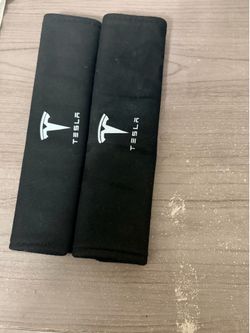 Tesla seat belt pad