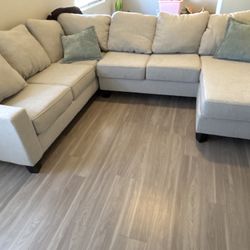 Sectional pillows included. 