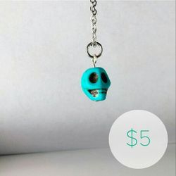 Skull charm necklace