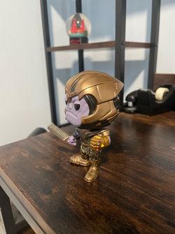 Brand: Funko •  Line: Pop! Marvel •  Character: Thanos (battle-damaged / armored version) Movie: Avengers: Endgame Pop number: #453