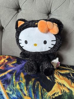 Hello Kitty, black cat plush