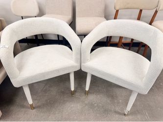 Pair of Hennigan textures fabric dining arm chairs