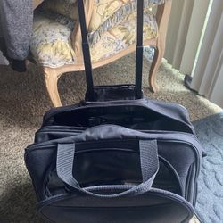 Travelers Choice black rolling laptop bag or briefcase / travel luggage 