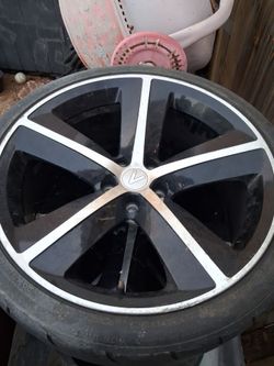 Twenty inch low profile five star rims off a dodge challenger
