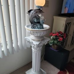 Dolphin Water Fountain decor indoor or outdoor 


