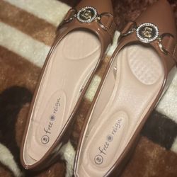 Elegant Brown Flats With Gold Embellishments 