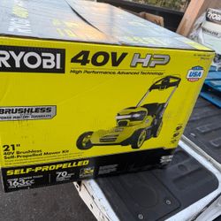 Ryobi Lawnmower ryobi self propelled come w 2 batteries and fast charger new 