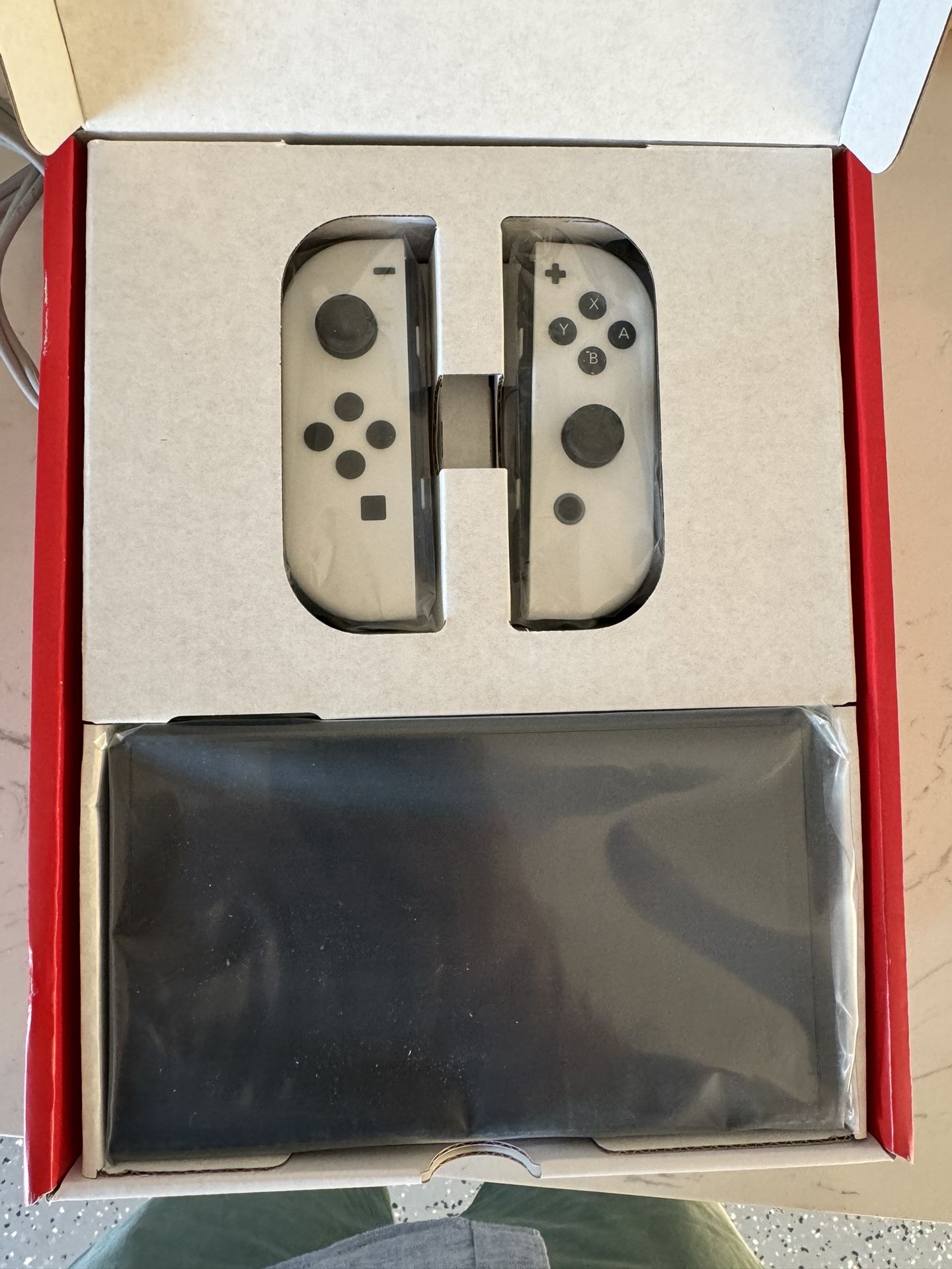 Nintendo Switch (OLED model) with White Joy Con Video games & Consoles